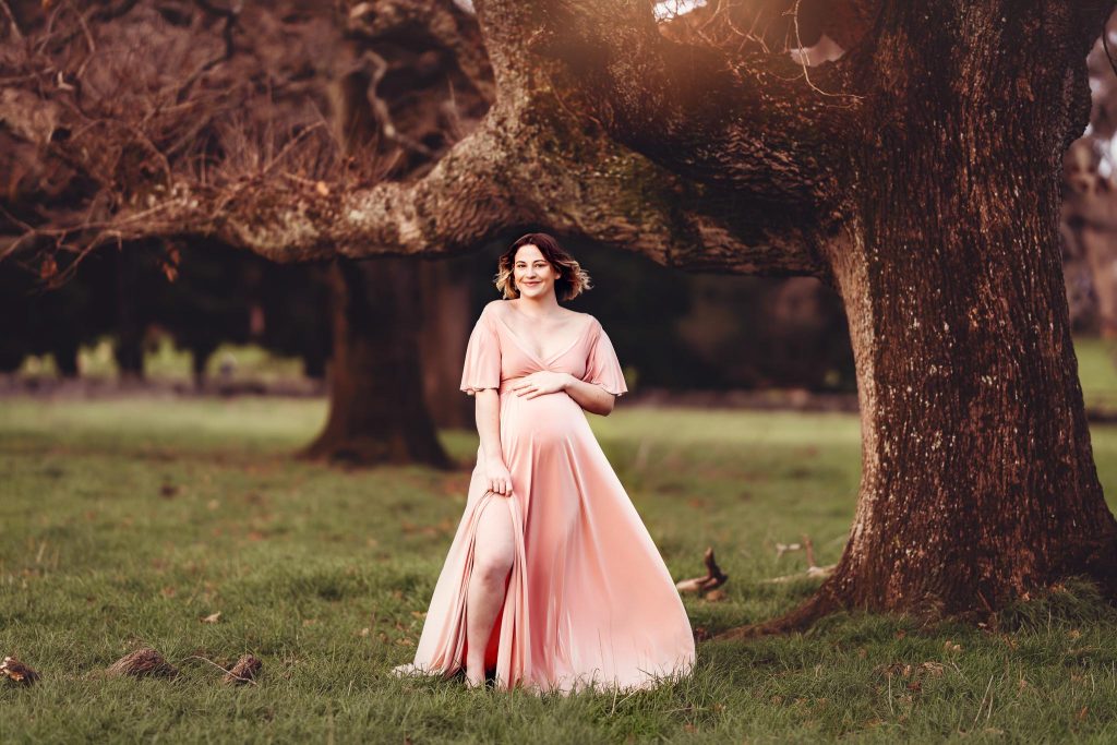 pregnant lady in pink dress - Maternity photoshoots Auckland - Amber Farooq