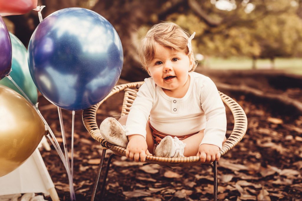 baby on her first brithday - auckland cake smash & milestone photography by Amber Farooq
