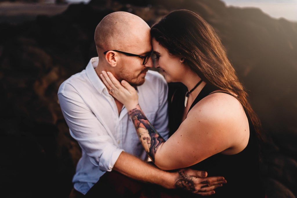 Couple hugging - Auckland engagement photography - Amber Farooq Engagement Photographer