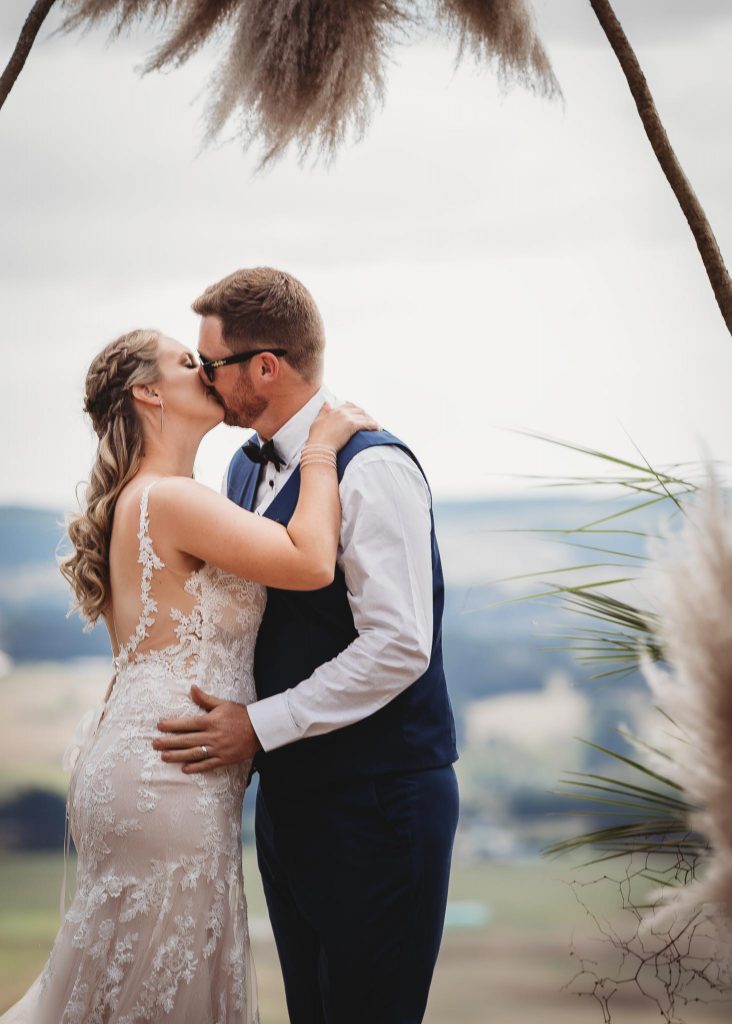 bride and groom kissing - Auckland Wedding Photographer