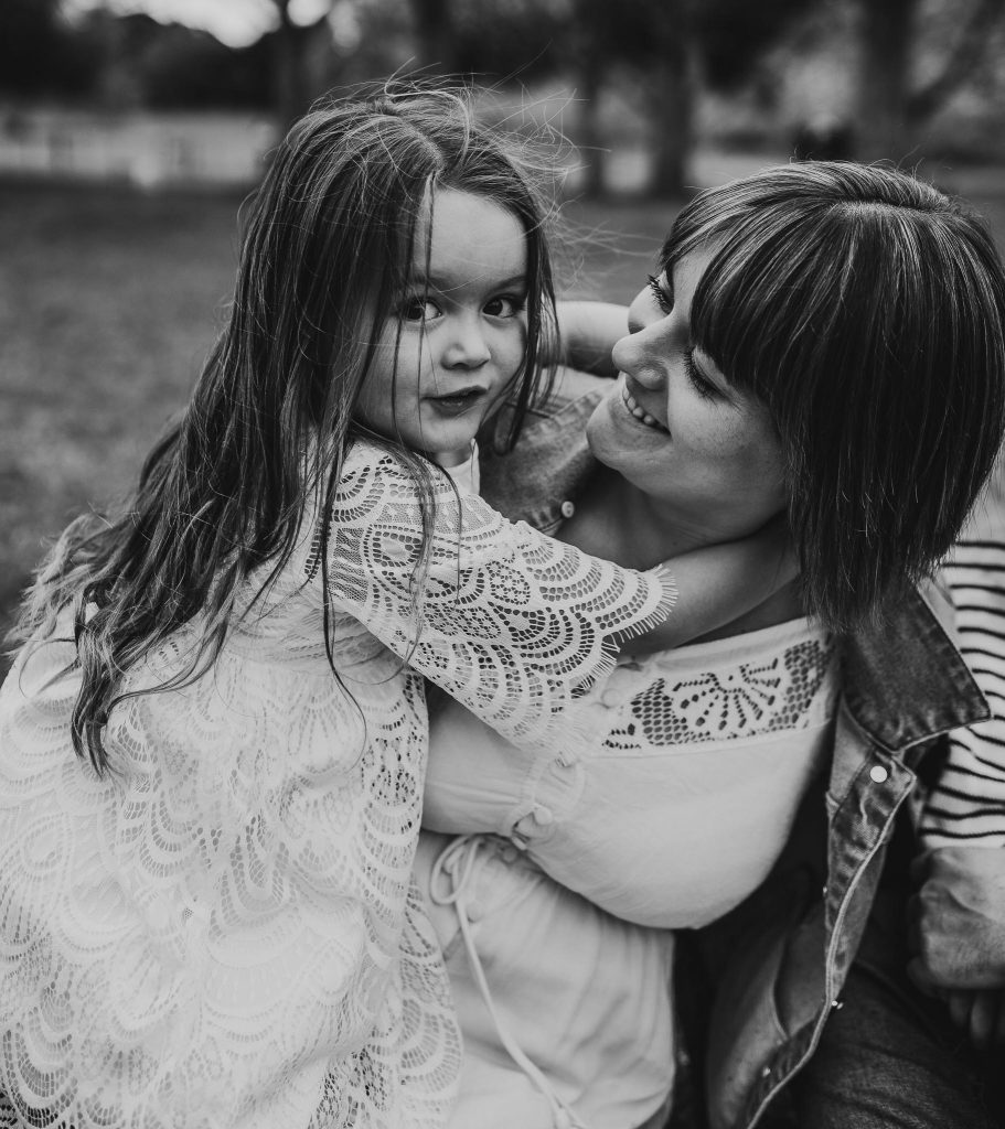 girl with mother Auckland family photography session at Auckland Cornwall Park