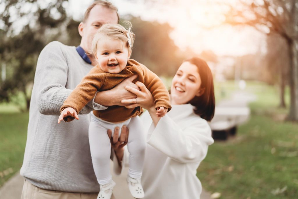 girl with parents Auckland boho Cake Smash photo session - Milestone Photography