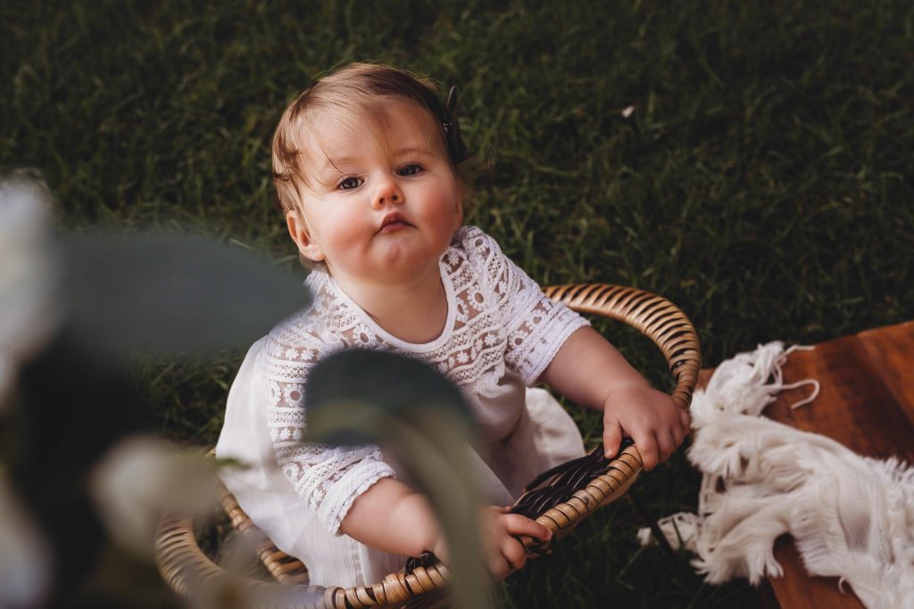 Auckland Cake Smash photo session at Cornwall park for baby girl - Milestone Photography