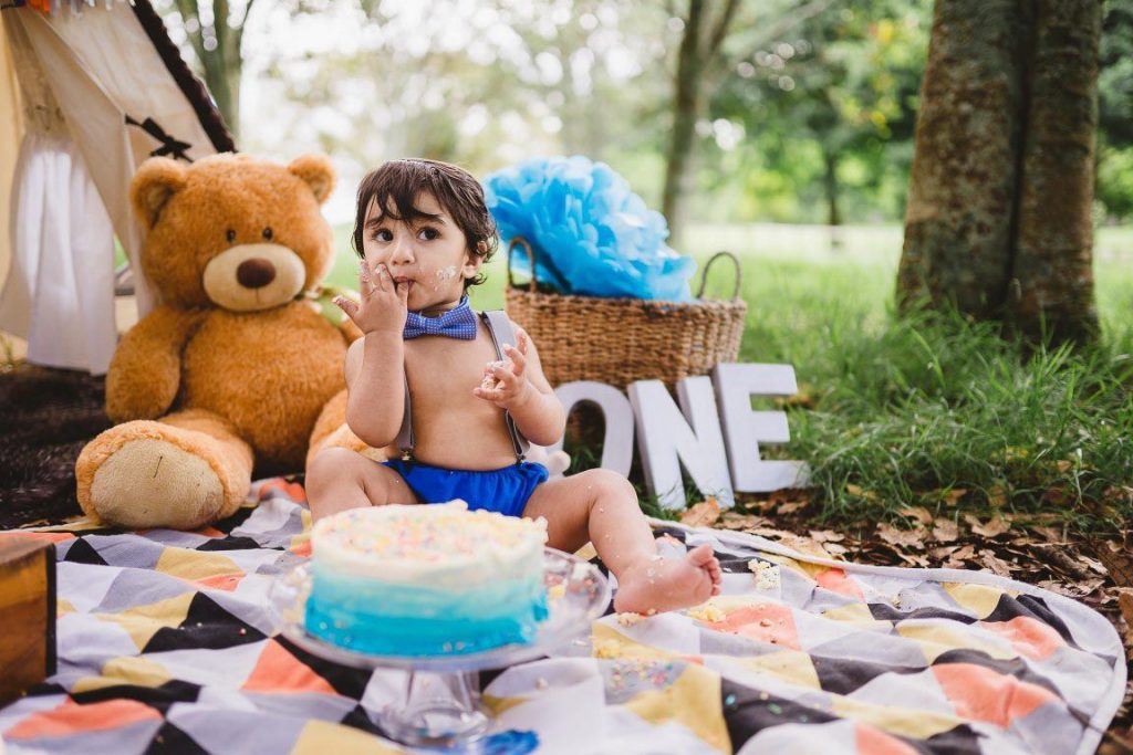 Auckland Cake Smash photo session at Cornwall park for baby boy - Milestone Photography