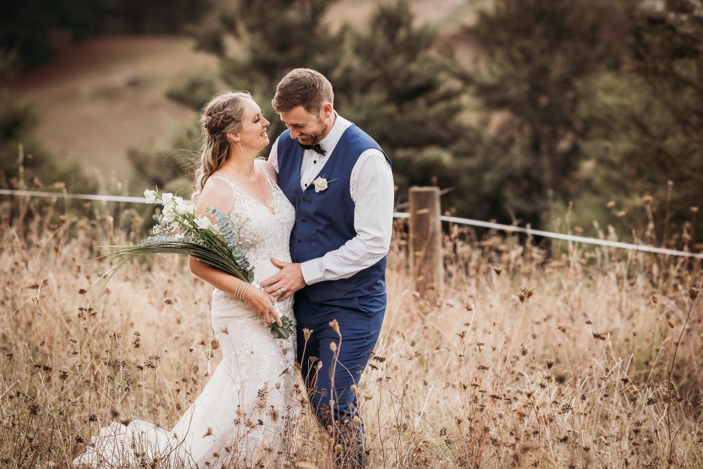 Auckland wedding bride and groom photo session at Kumeu Auckland during sunset.