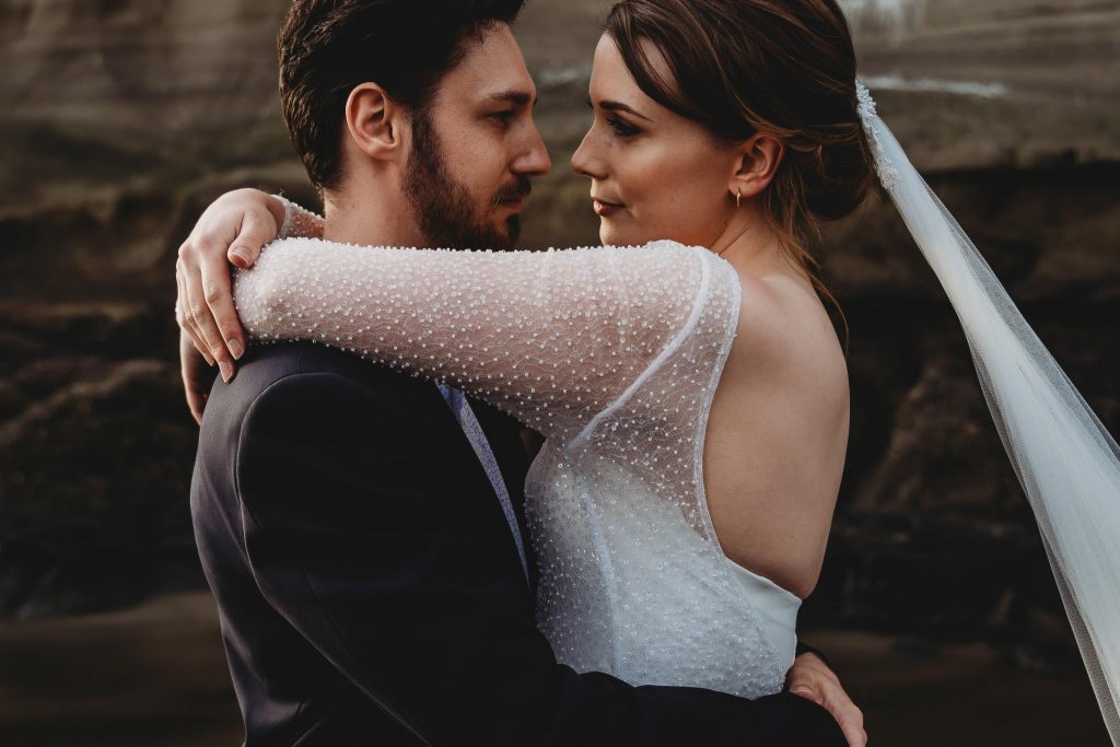 bride looking at groom with love - Auckland Wedding Photographer