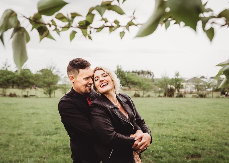 bride and groom smiling in Auckland Amber Farooq wedding photography