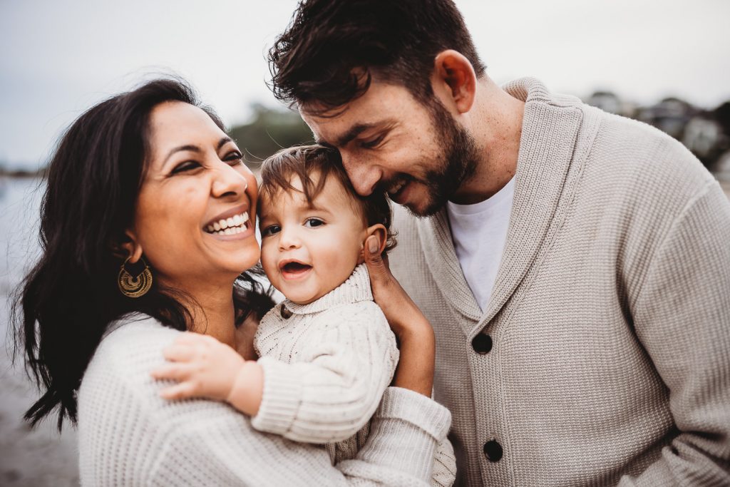 parents loving one year old boy
