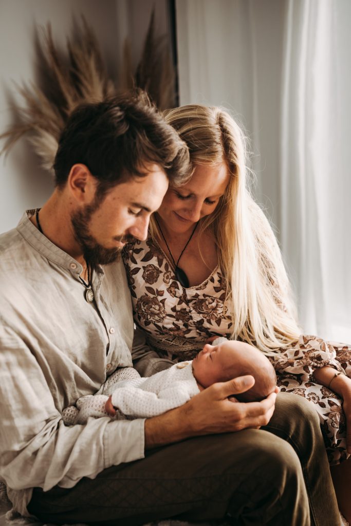 Parents with newborn baby boy