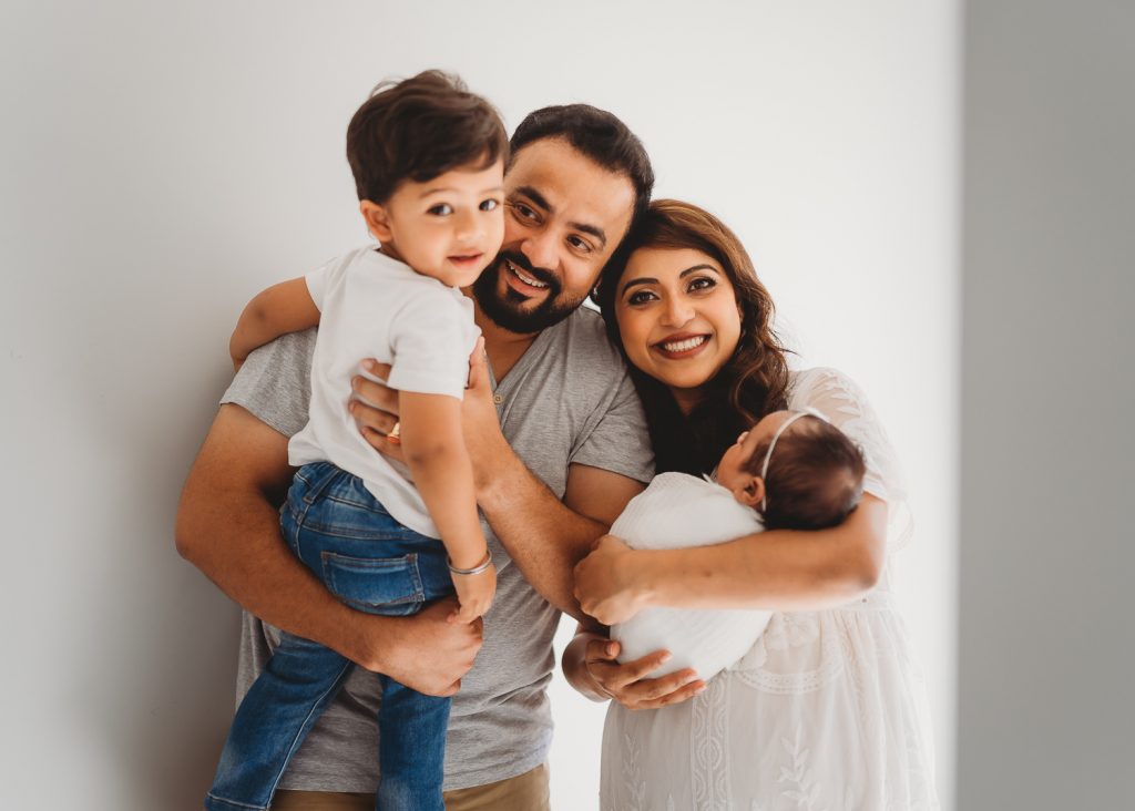 happy family with newborn