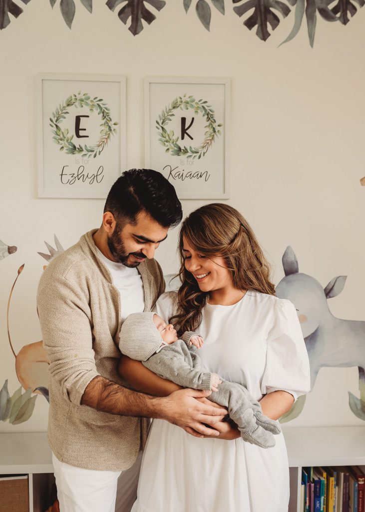 Auckland Lifestyle Newborn Photographer - Parents holding baby