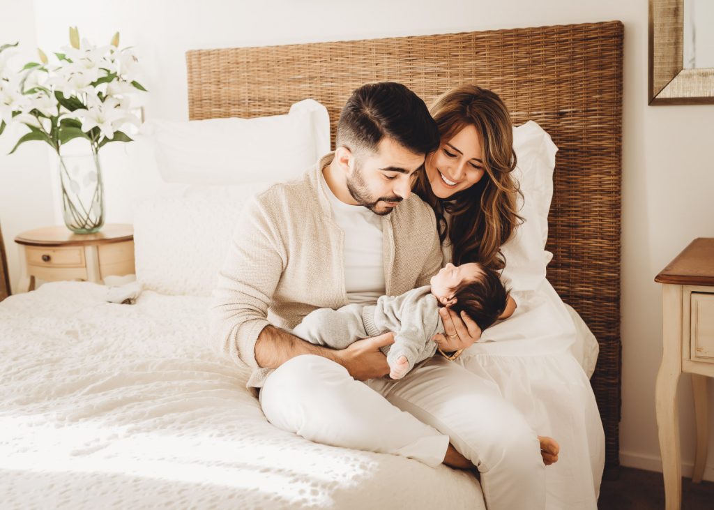 father mother with newborn and sibling - Auckland Lifestyle Newborn Photographer Amber Farooq