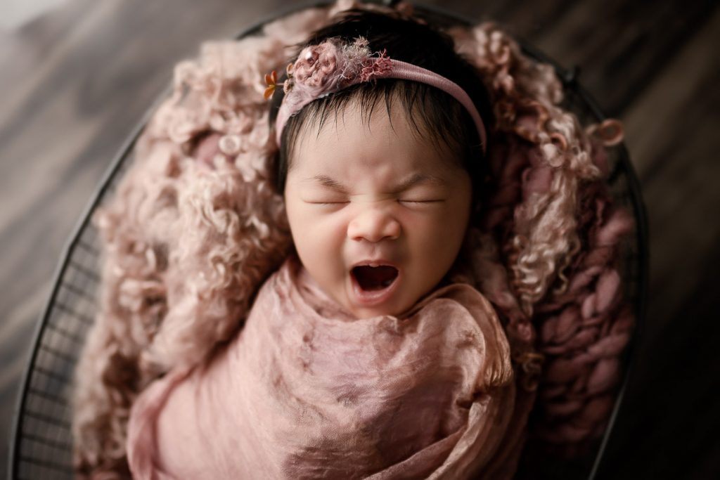 newborn yawning – Auckland studio newborn photographer