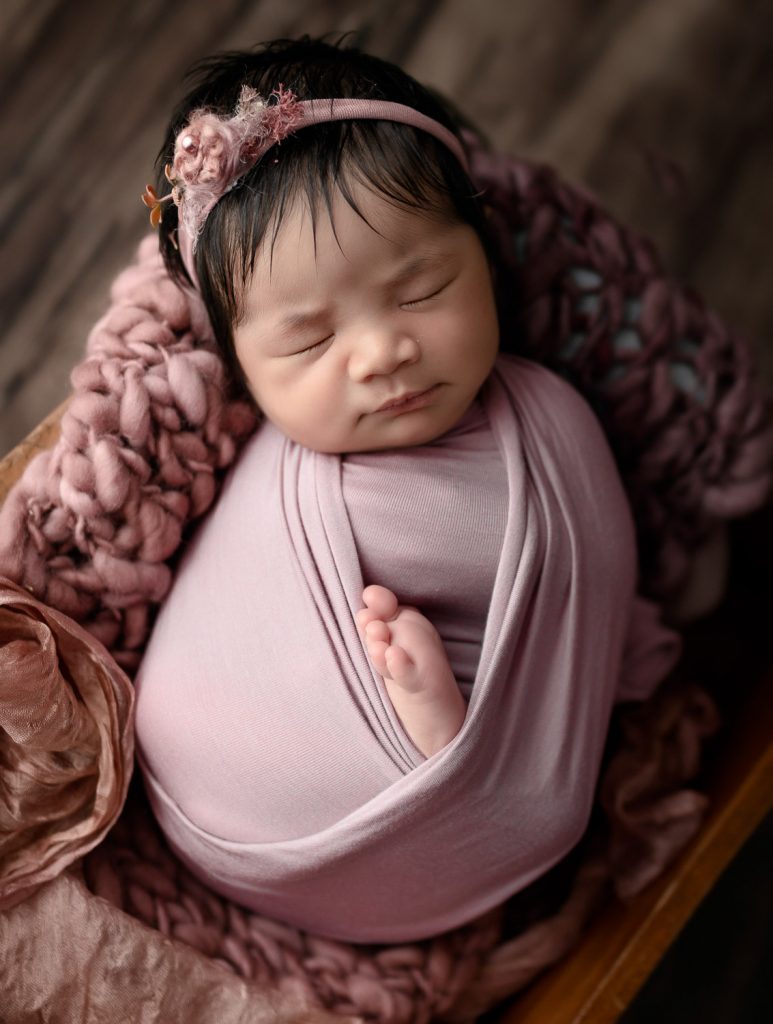 cute newborn girl – Auckland studio newborn photographer