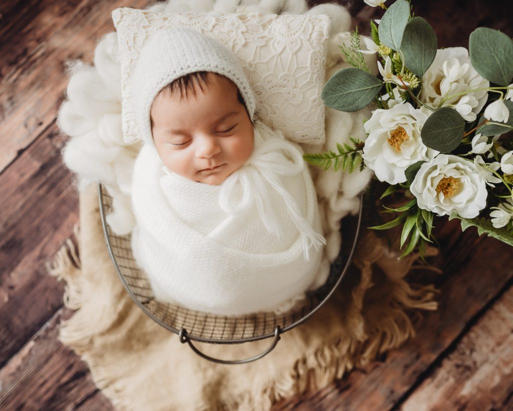 newborn sleeping on pillow – Auckland studio newborn photographer