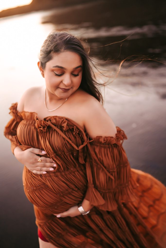Auckland maternity photographer captures radiant glow of mom expecting her second child.