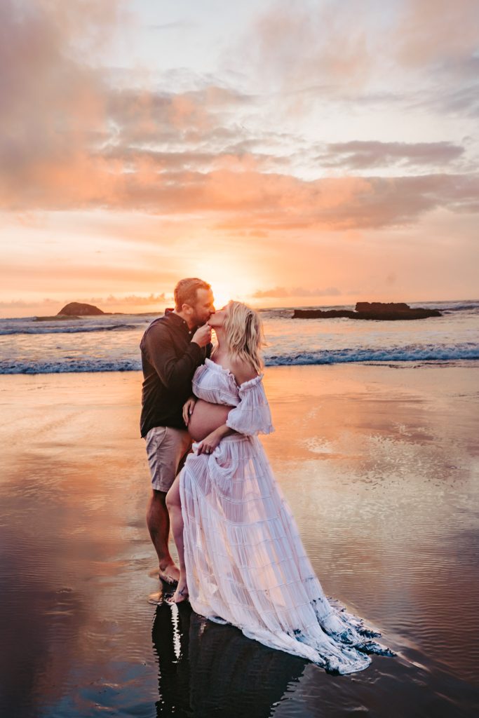 Auckland maternity photographer: Capturing the tender connection between a pregnant woman and her partner.