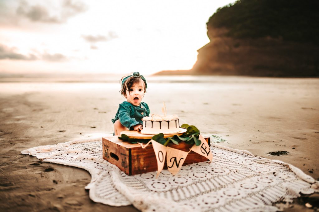 baby girl in green dress